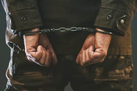 Handcuffed soldier arressted