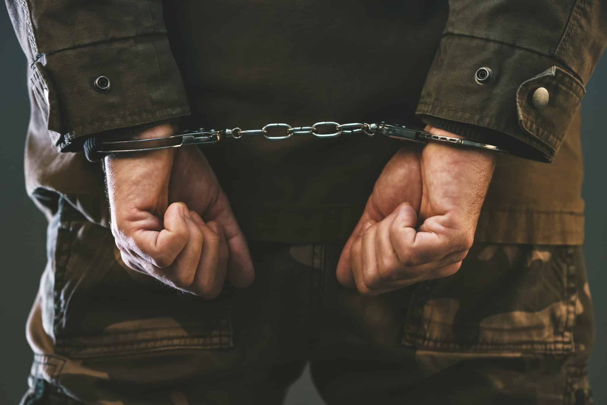 Handcuffed soldier arressted